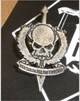 Lost cap badge, the
